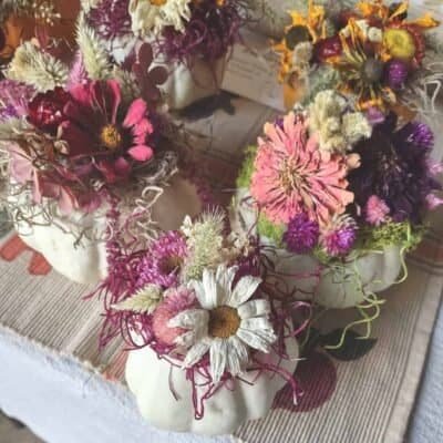 minigourds mini pumpkins decorated with dried flowers