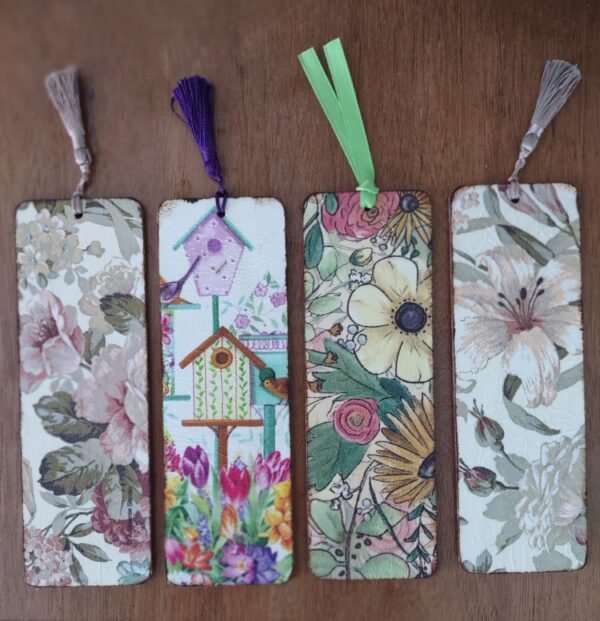Wood bookmarks with garden themed graphics.