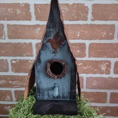 Blue Birdhouse with rusty roof