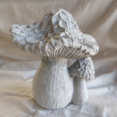 two concrete mushrooms