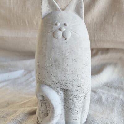 concrete skinny cat standing