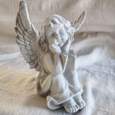 Small concrete angel