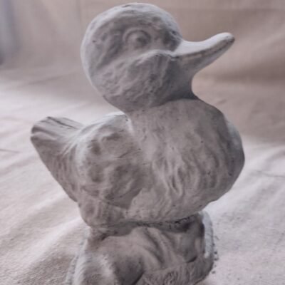 small concrete duck