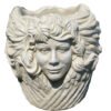concrete flower pot with 3 faces around it