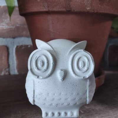 small concrete owl