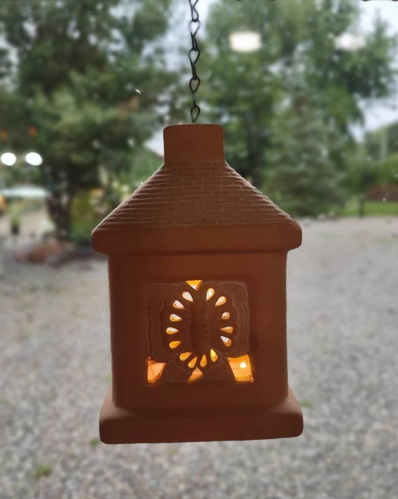 Terra cotta lantern with lights