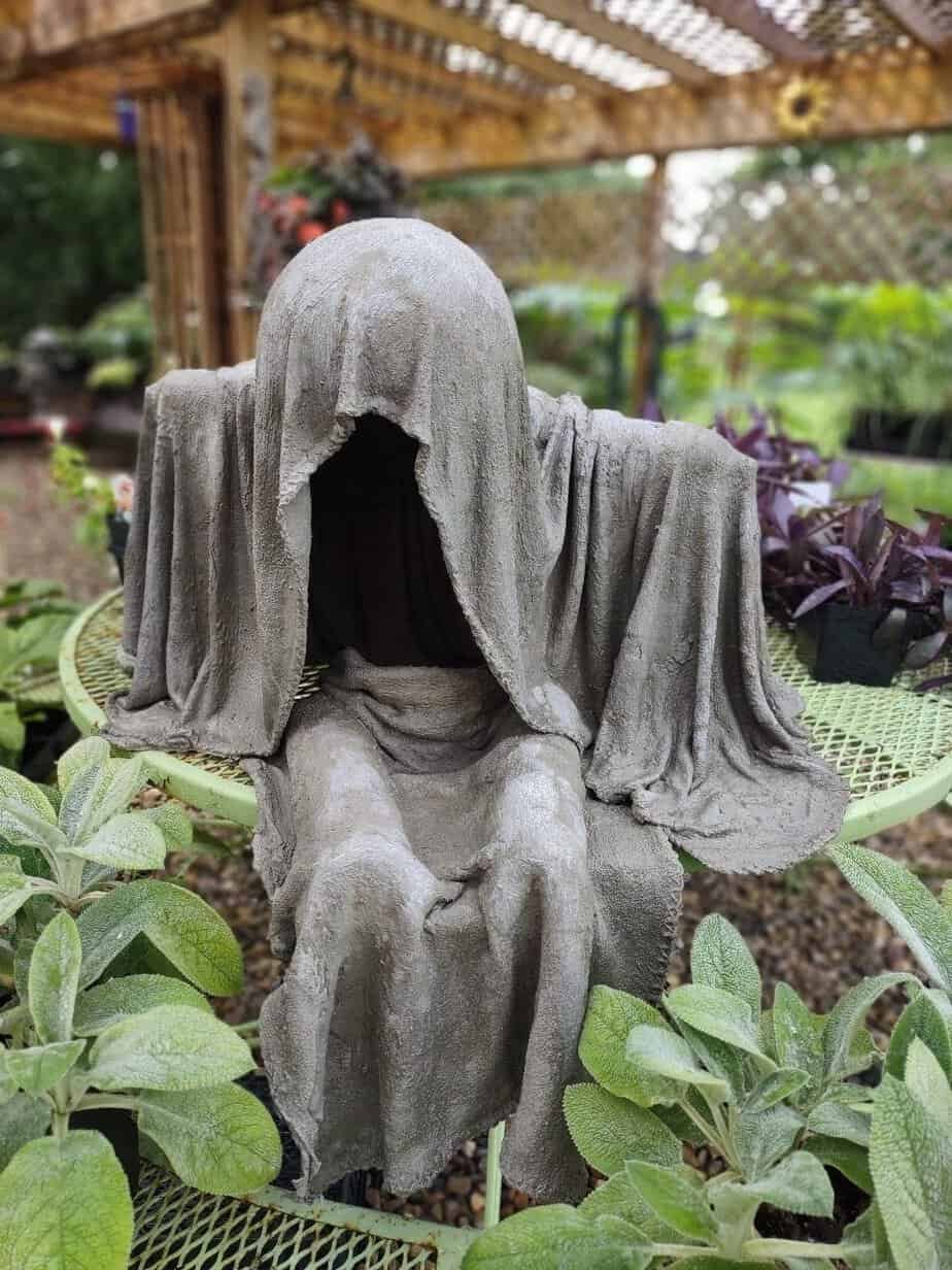 draped seated soul