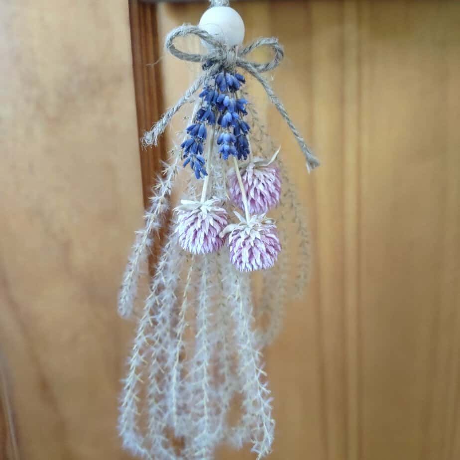 small angel made with dried flowers