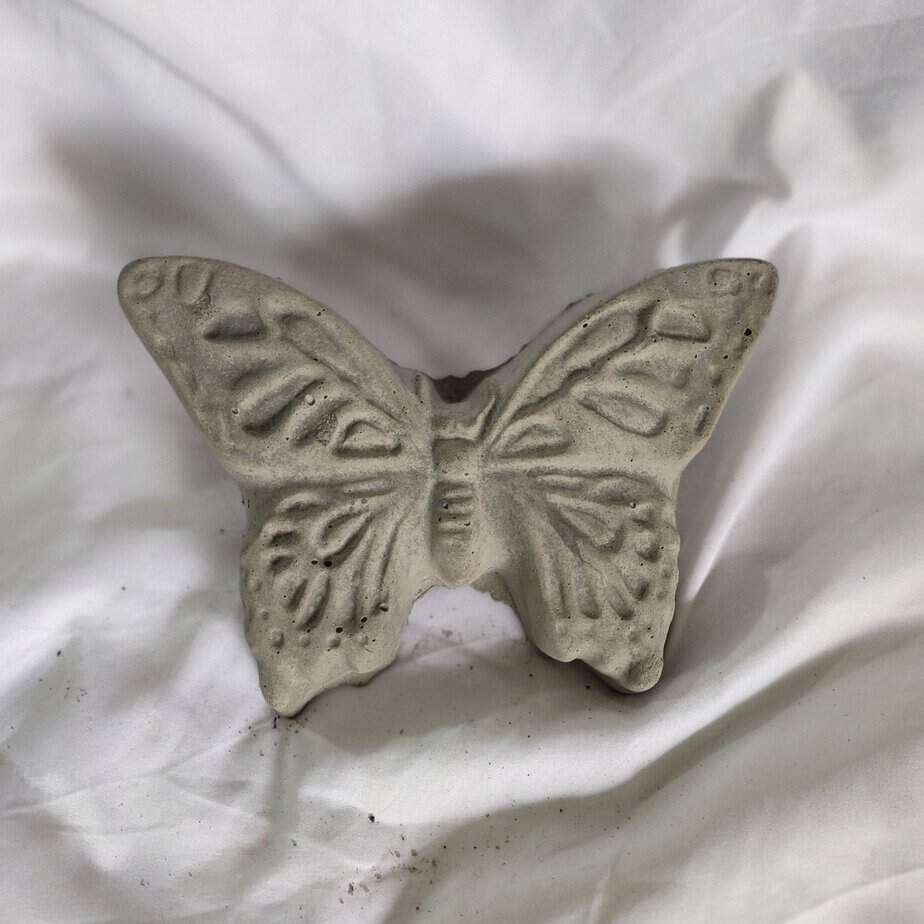 concrete butterfly plaque