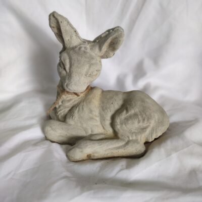 concrete deer laying