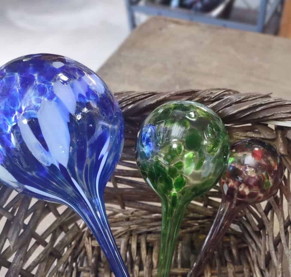 3 sizes of glass watering globes