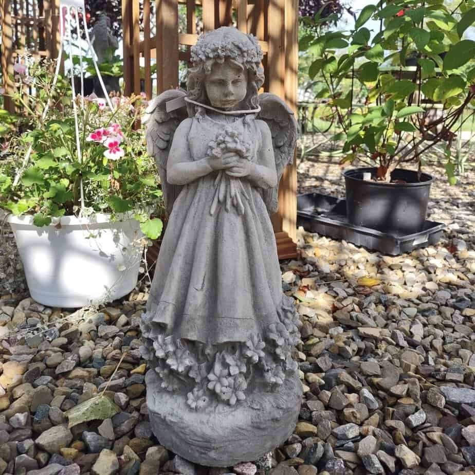 Concrete Angel Holding Flowers