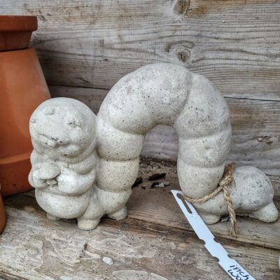 concrete inch worm statue